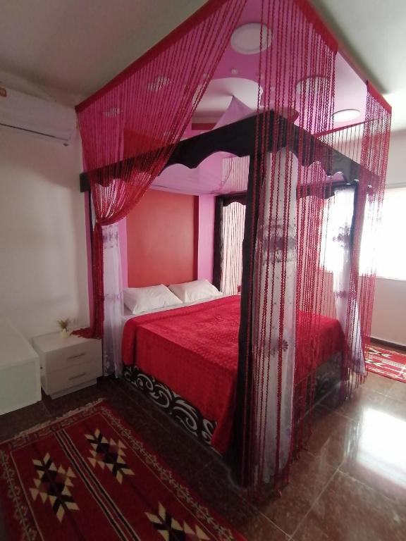 Postel nebo postele na pokoji v ubytování Petra paradise home
