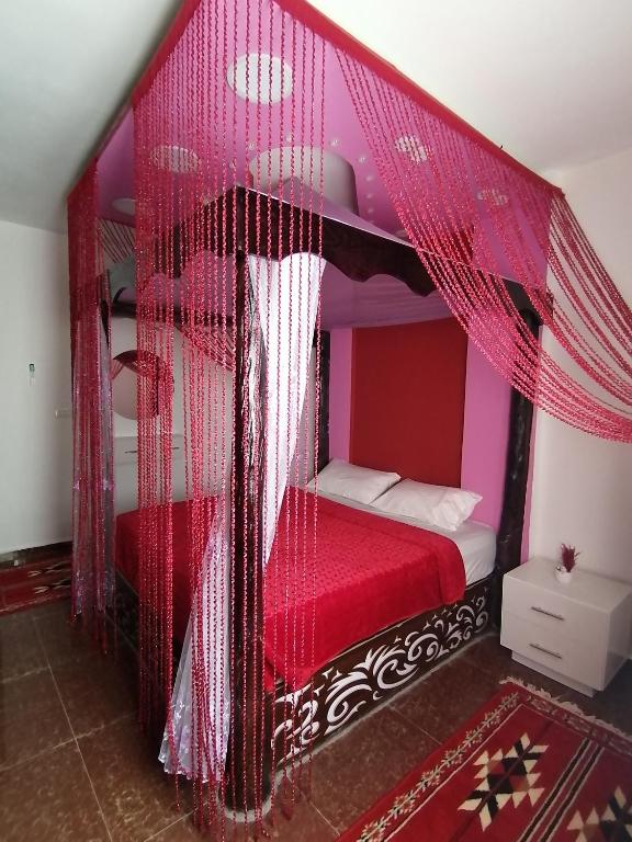 Postel nebo postele na pokoji v ubytování Petra paradise home
