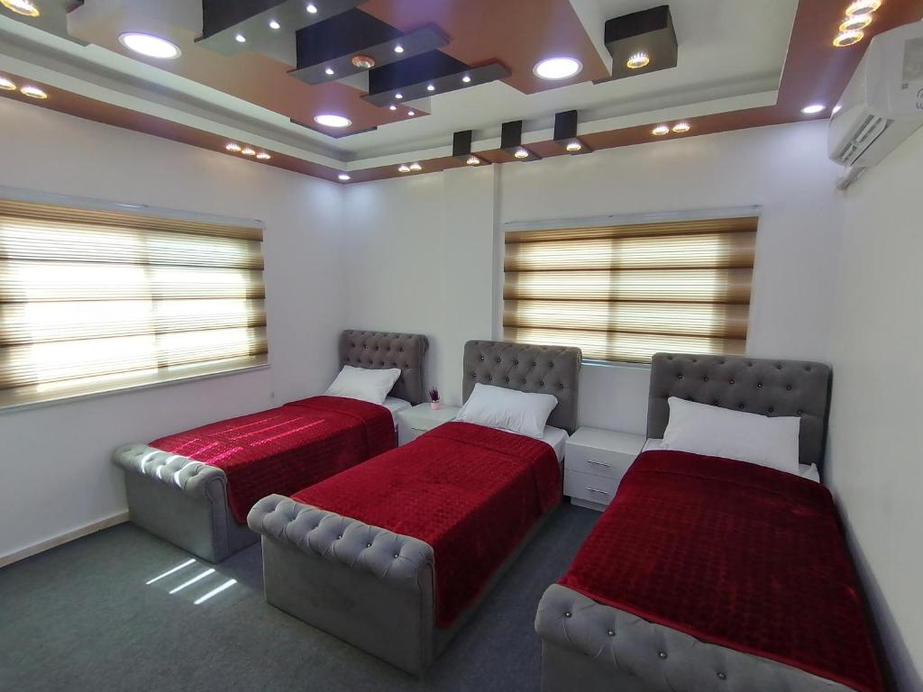 Postel nebo postele na pokoji v ubytování Petra paradise home