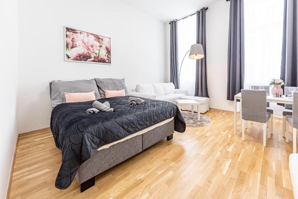 Premium City Apartment in Center of Vienna 객실 침대