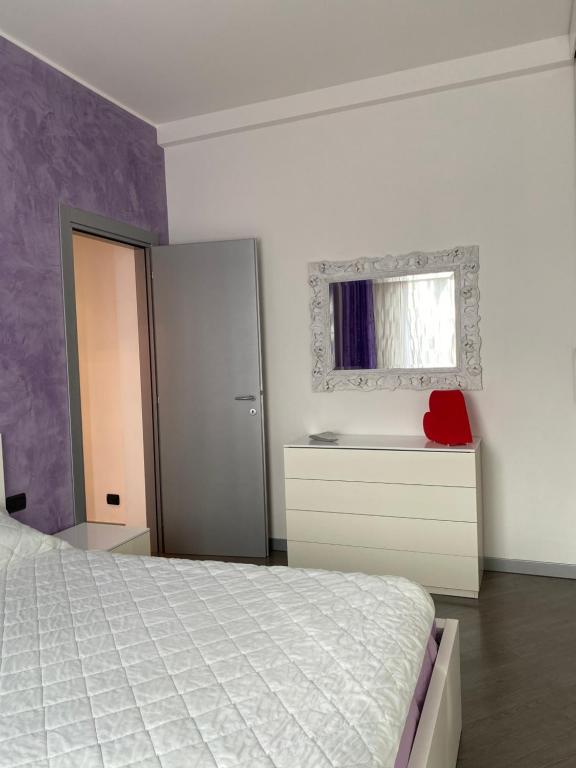 Posteľ alebo postele v izbe v ubytovaní Petit place incantevole a due passi da Milano!