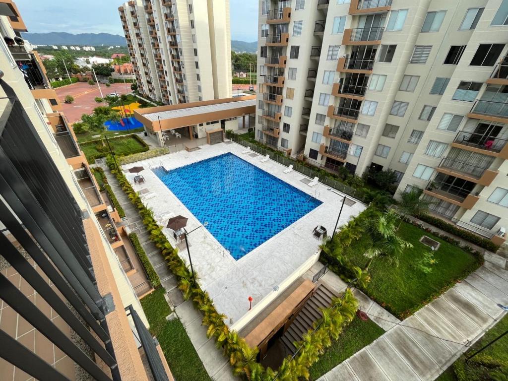 an overhead view of a swimming pool in a building at Peñalisa Club House in Ricaurte