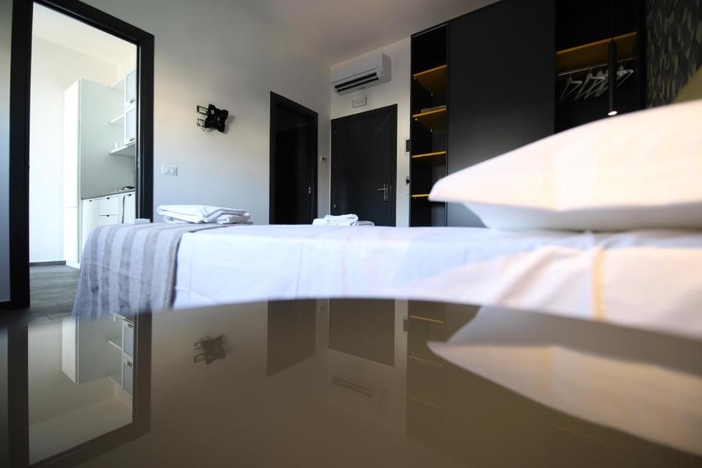 Posteľ alebo postele v izbe v ubytovaní Le Cupole Design