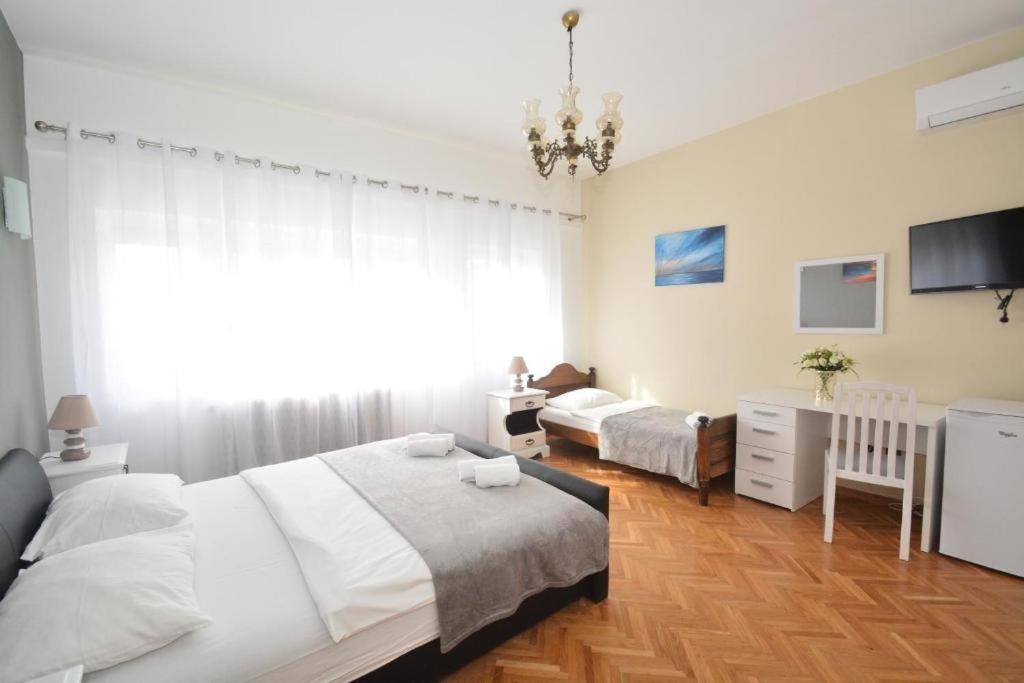 Fotografia z galérie ubytovania Apartments and rooms by the sea Podstrana, Split - 10301 v destinácii Podstrana