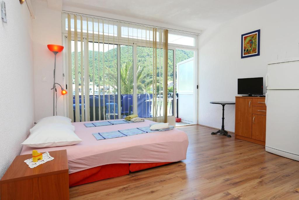 Fotografia z galérie ubytovania Apartments by the sea Zuljana, Peljesac - 10218 v Žuljane