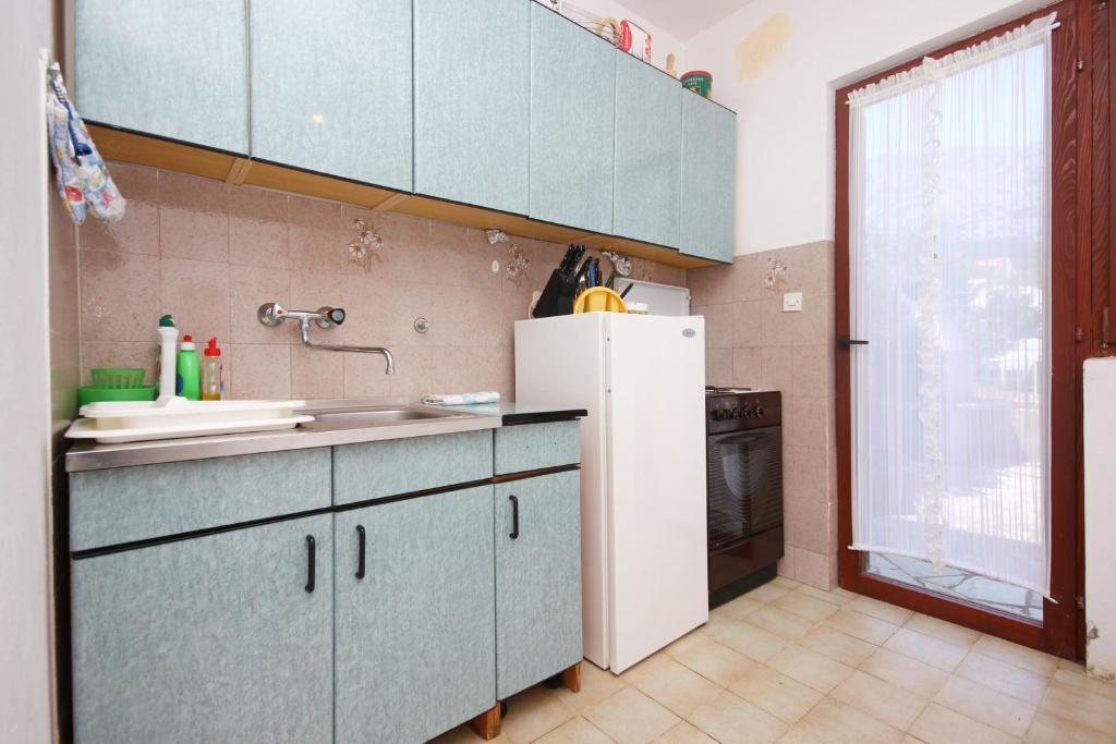 Kuchyňa alebo kuchynka v ubytovaní Apartments with parking spaces Orebic, Peljesac - 10193