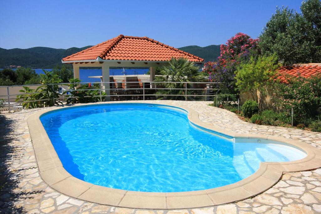 Fotografia z galérie ubytovania Seaside family friendly house with a swimming pool Viganj, Peljesac - 10253 v destinácii Viganj