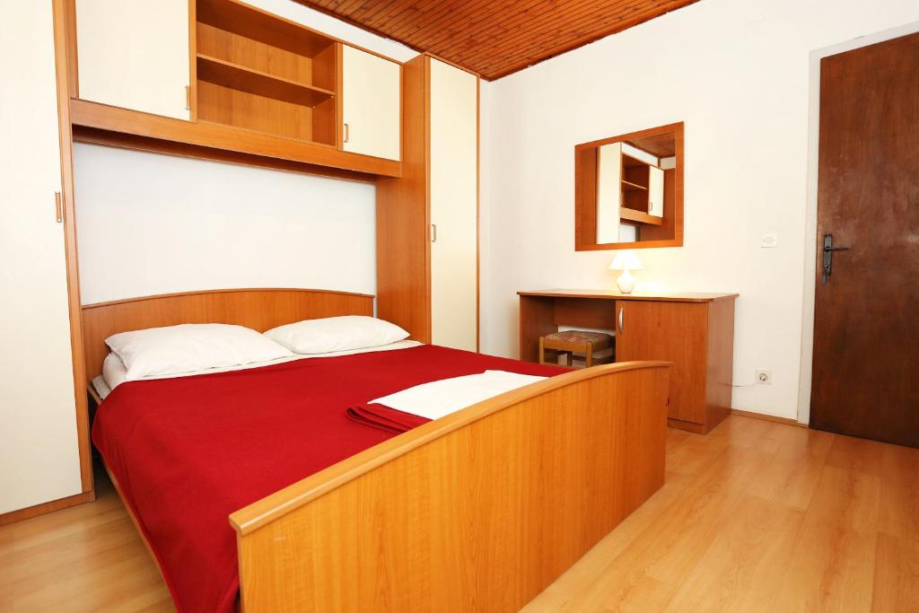 Postel nebo postele na pokoji v ubytování Apartments with parking spaces Orebic, Peljesac - 10102