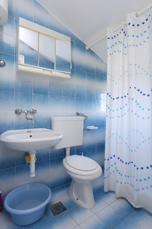 Kúpeľňa v ubytovaní Apartments by the sea Drace, Peljesac - 10211