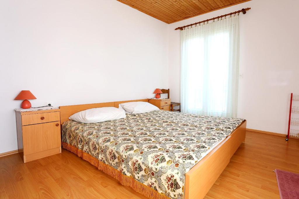 Posteľ alebo postele v izbe v ubytovaní Apartments by the sea Drace, Peljesac - 10211