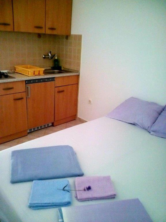 Posteľ alebo postele v izbe v ubytovaní Apartment Starigrad 11683b
