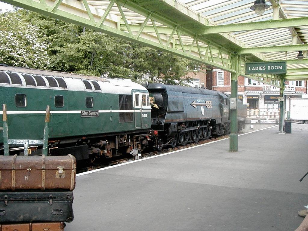 a train is parked at a train station at Purbeck House Hotel & Louisa Lodge in Swanage