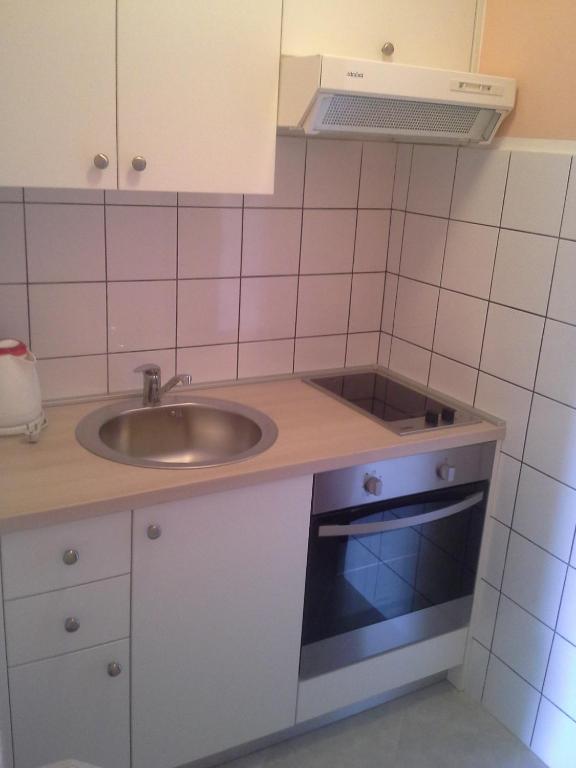 Kuchyňa alebo kuchynka v ubytovaní Apartment Crikvenica 12116a