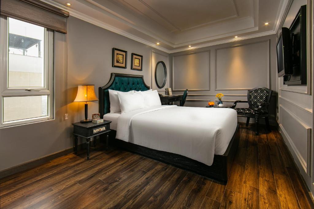 Postel nebo postele na pokoji v ubytování Scent Premium Hotel