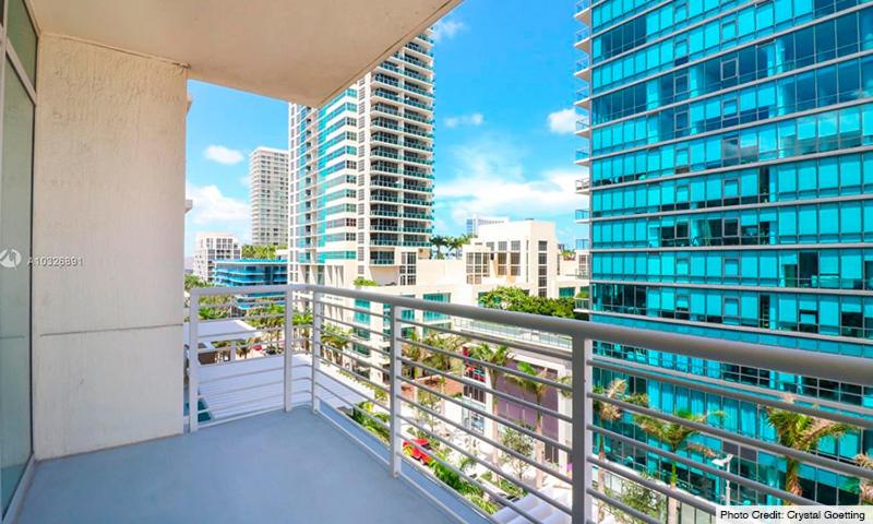 a balcony of a building with a view of a city at Wonderful 1 bedroom condo in Midtown. in Miami