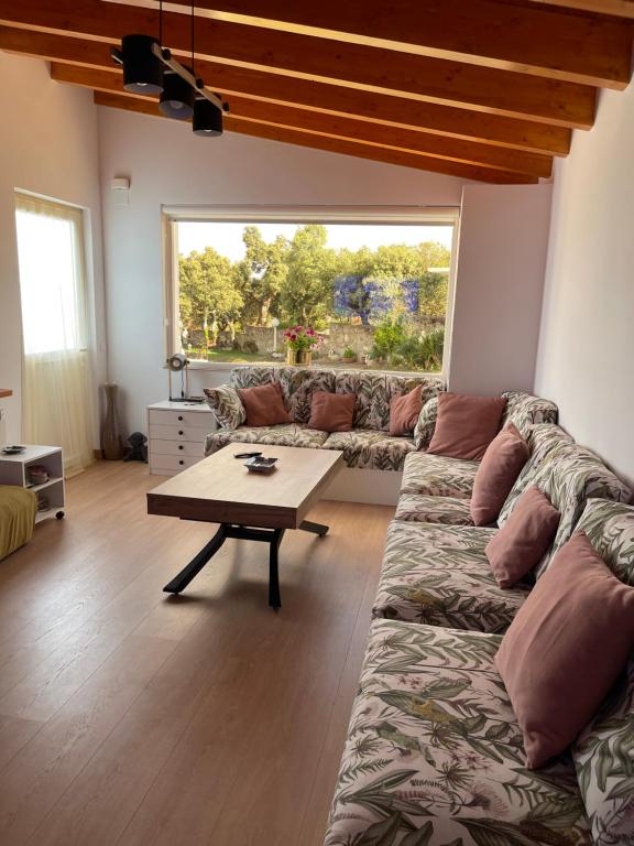Posezení v ubytování Villa Entre Encinas