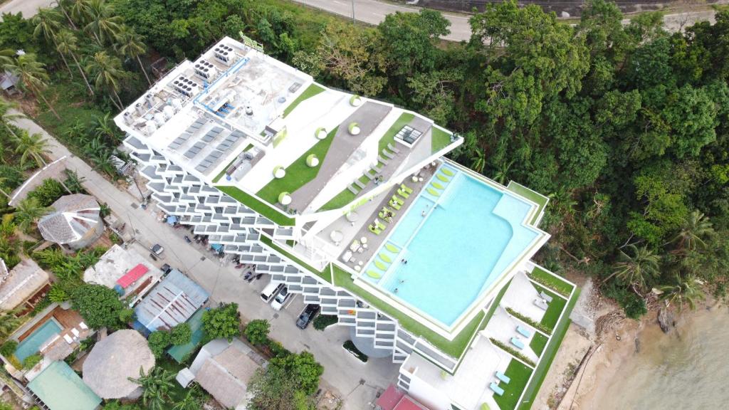 an overhead view of a building with a swimming pool at Lime Resort El Nido in El Nido