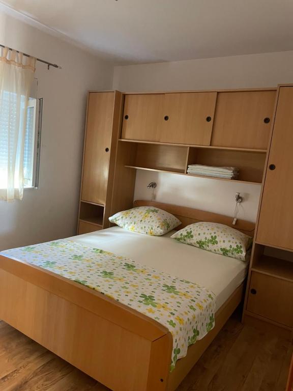 Postel nebo postele na pokoji v ubytování Apartman Jukic