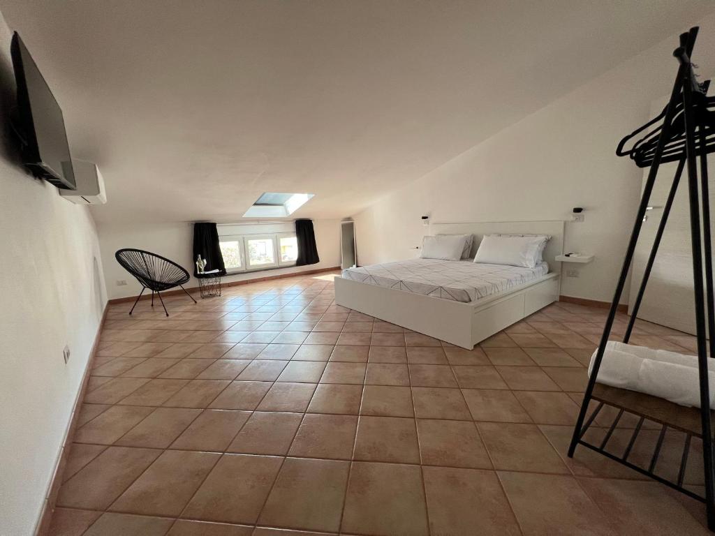 Postel nebo postele na pokoji v ubytování B-Guest House