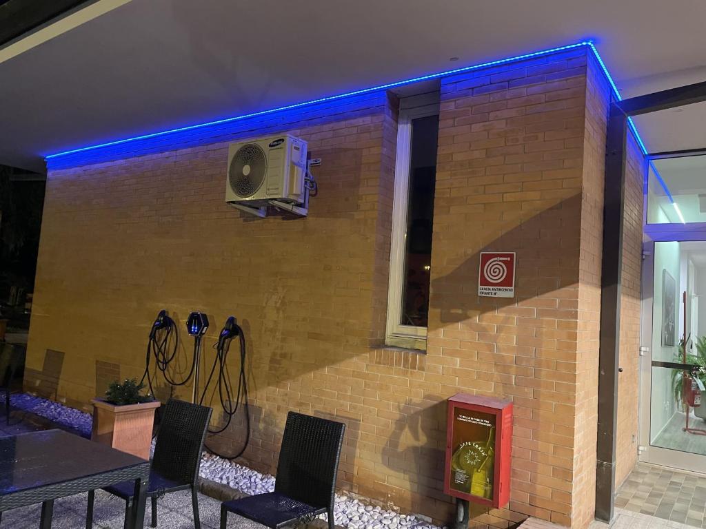 TV a/nebo společenská místnost v ubytování Hotel Petrarca