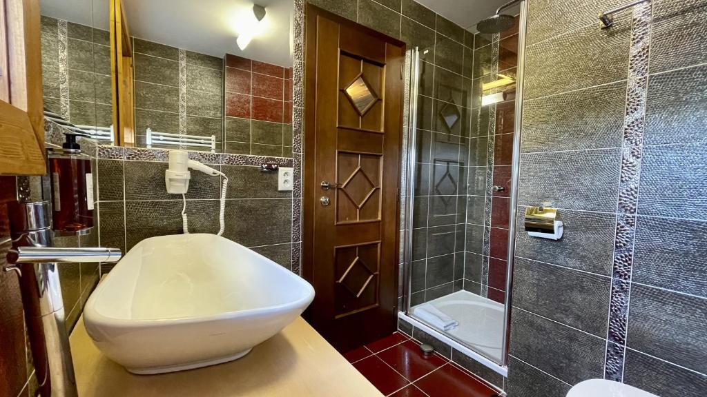 Koupelna v ubytování Resort Drevenice Terchova
