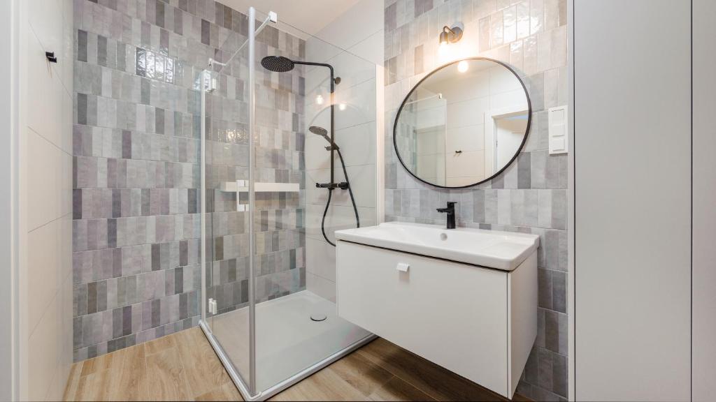Kúpeľňa v ubytovaní Apartamenty Sun & Snow Polanki Aqua z basenem