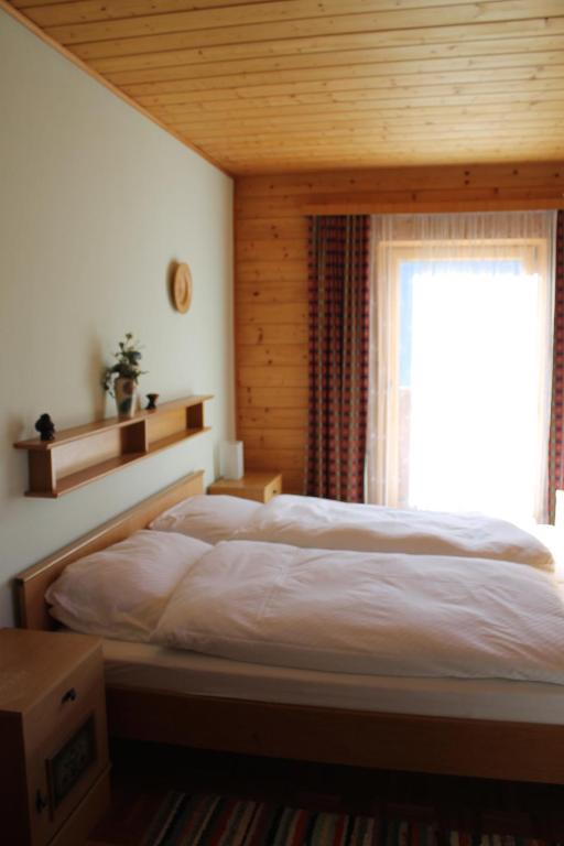 Postel nebo postele na pokoji v ubytování Gästehaus Moser