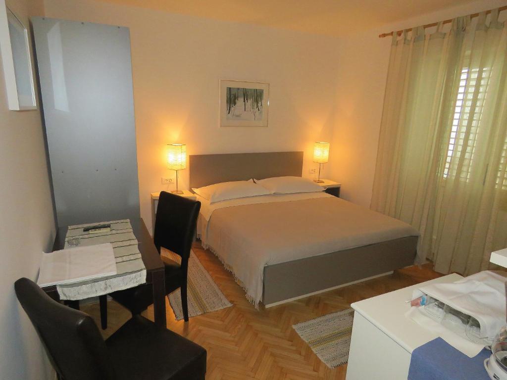 Posteľ alebo postele v izbe v ubytovaní Apartments Staničić