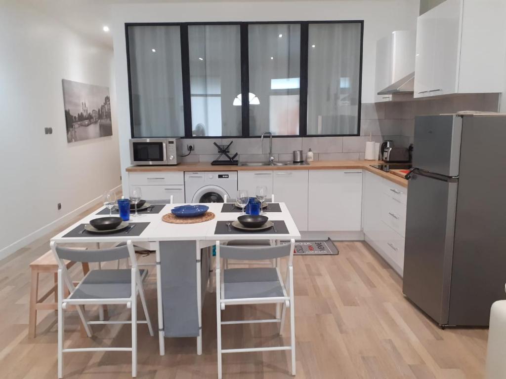Virtuvė arba virtuvėlė apgyvendinimo įstaigoje Appartement au coeur de Marans