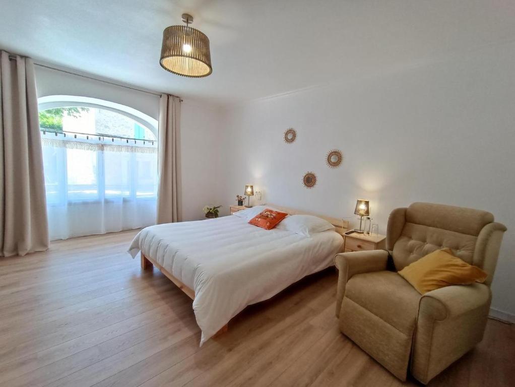 Posteľ alebo postele v izbe v ubytovaní Maison sur le Lot