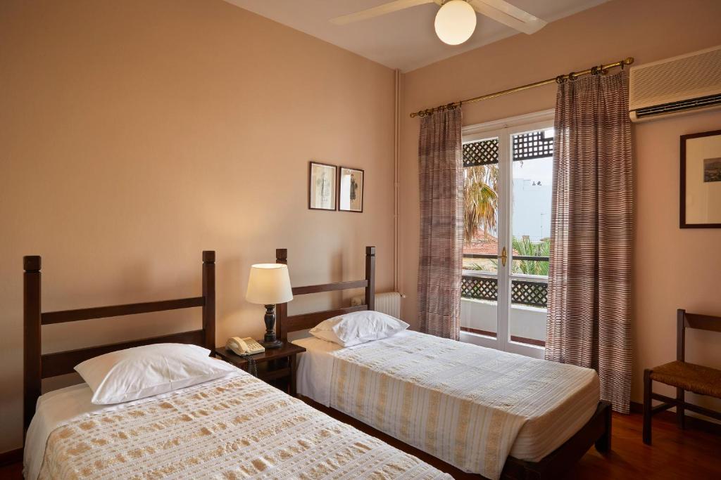Postel nebo postele na pokoji v ubytování Doma Hotel