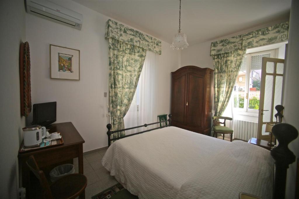 Postel nebo postele na pokoji v ubytování Villa L'Aurora