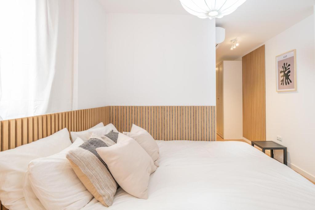 Posteľ alebo postele v izbe v ubytovaní Malasaña 13, Nuevo apartamento 2 dormitorios, centro histórico, todos servicios, barrio tranquilo, MS