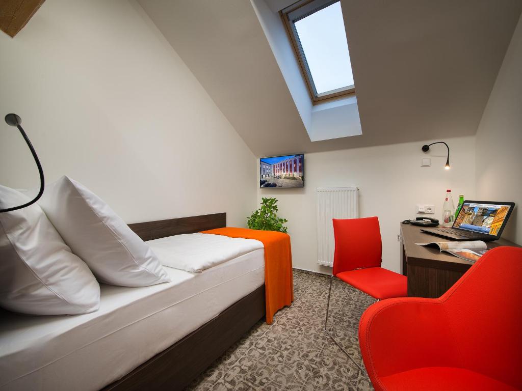 TV a/nebo společenská místnost v ubytování EA Business Hotel Jihlava
