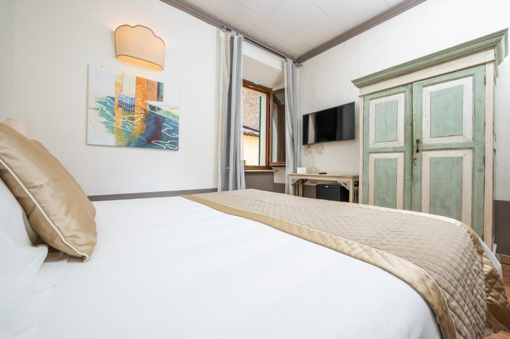 Postel nebo postele na pokoji v ubytování Albergo Le Terme