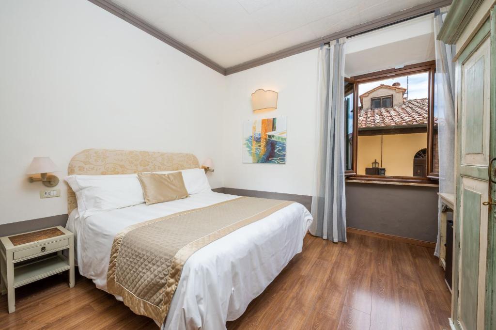 Postel nebo postele na pokoji v ubytování Albergo Le Terme