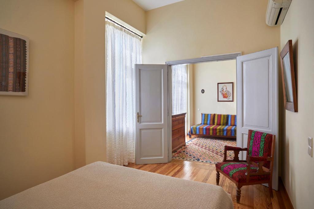 Postel nebo postele na pokoji v ubytování Doma Hotel