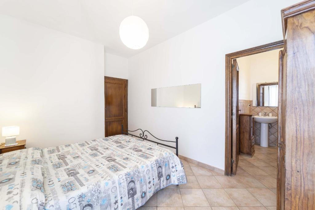 Posteľ alebo postele v izbe v ubytovaní Stintino sea front apartments B