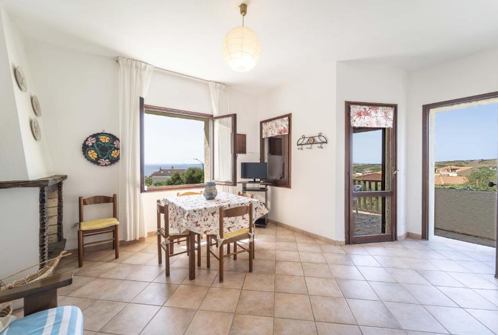 Televízia a/alebo spoločenská miestnosť v ubytovaní Stintino sea front apartments B