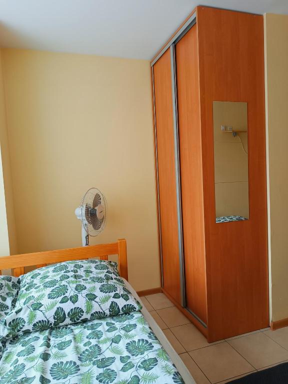 Postel nebo postele na pokoji v ubytování Dom Gościnny Piotr