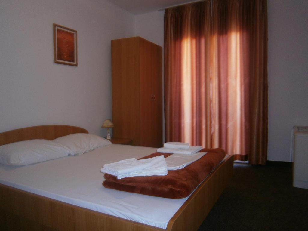Postel nebo postele na pokoji v ubytování Guest House Babić