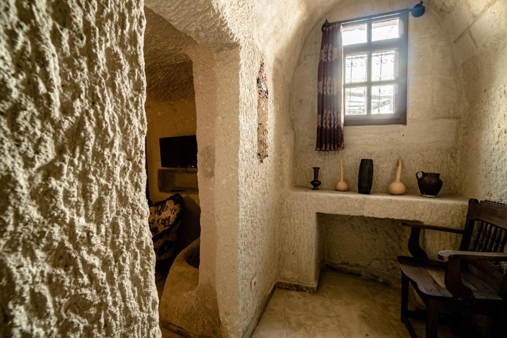 TV a/nebo společenská místnost v ubytování Amber Cave Suites