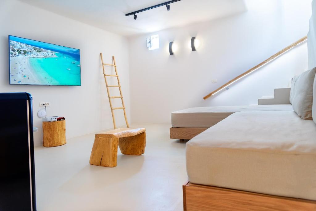 Кровать или кровати в номере Mystic Villas Koufonisi