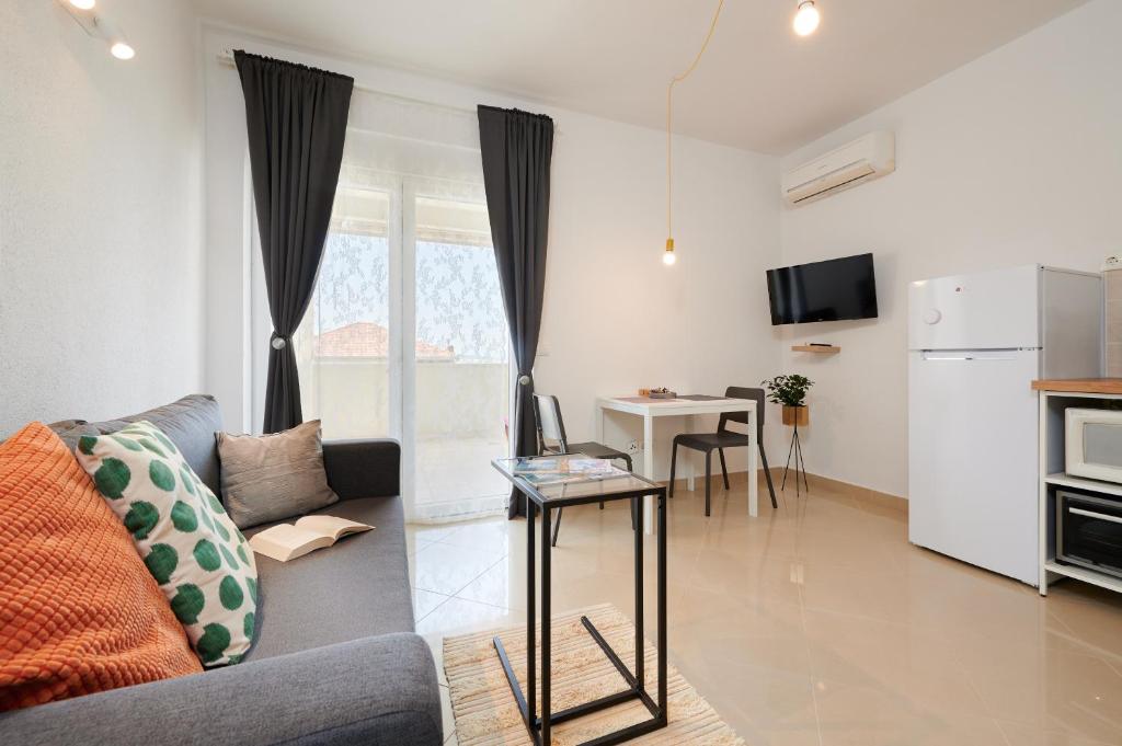 Kuchyň nebo kuchyňský kout v ubytování T&T Sea View Apartments