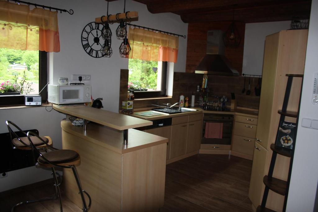 Kuchyň nebo kuchyňský kout v ubytování Chata na řece Sázavě