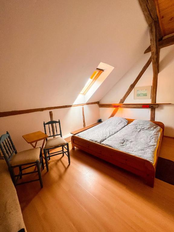 Postel nebo postele na pokoji v ubytování Agro - Dom Wsrod Lasow