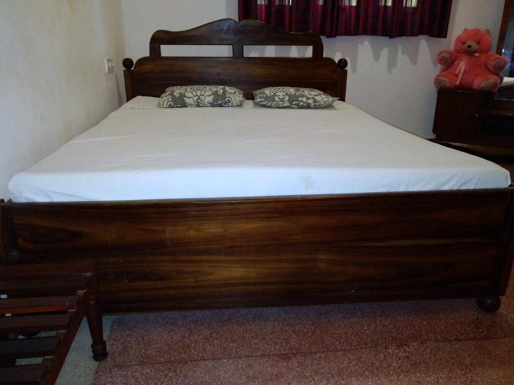 Postel nebo postele na pokoji v ubytování Holiday Home Anuradapura