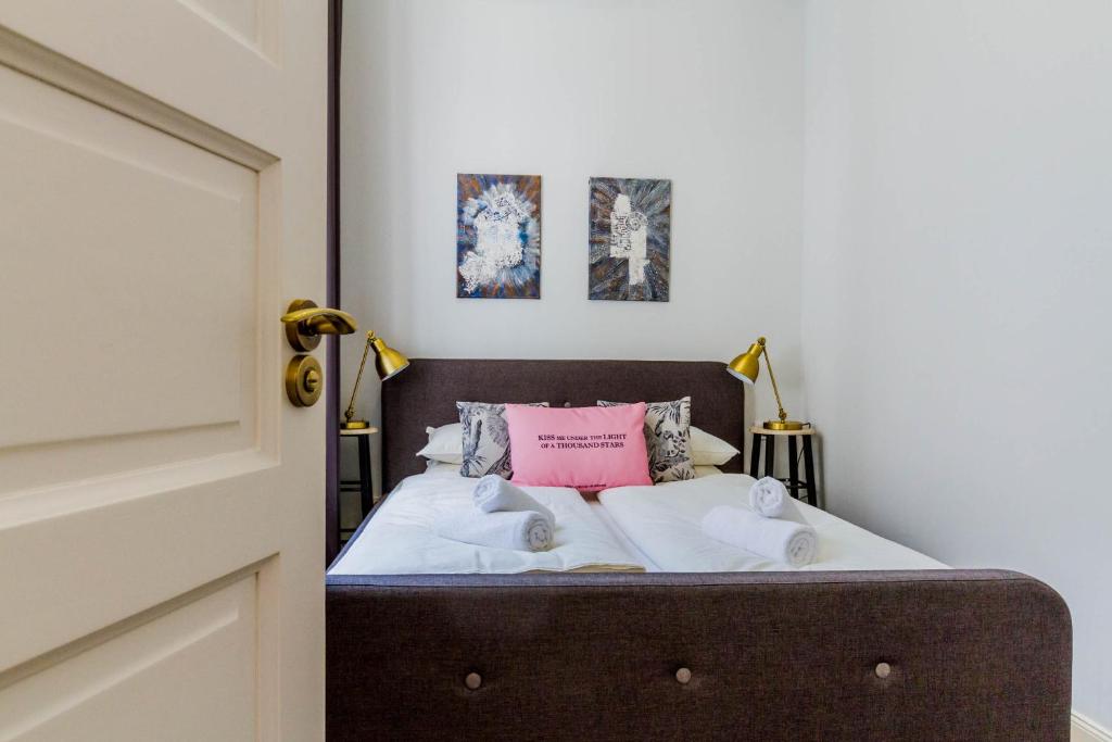 Posteľ alebo postele v izbe v ubytovaní Bengt Apartment Kiraly str.
