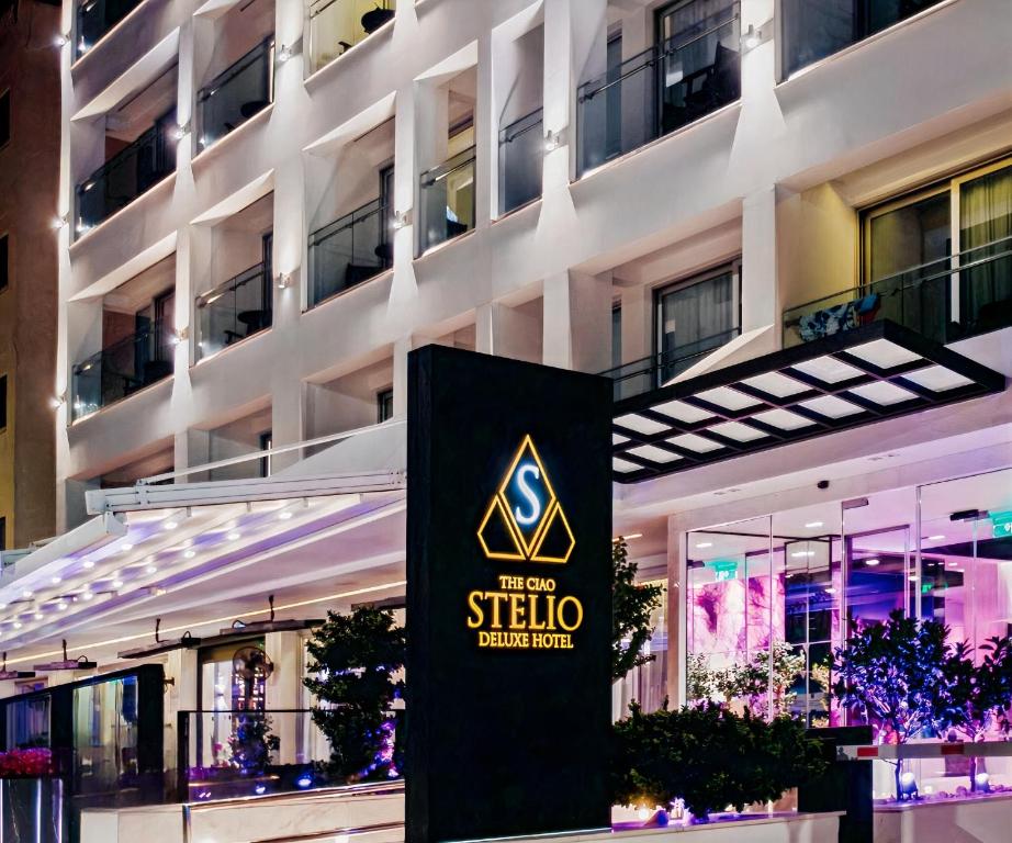 a hotel sign in front of a building at The Ciao Stelio Deluxe Boutique Hotel - Adults Only in Larnaka