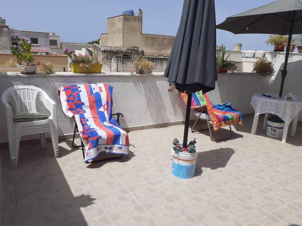 Patio nebo venkovní prostory v ubytování Casa dello Scoglio nel mare